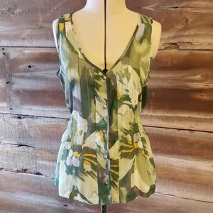 Sleeveless, button up sheer blouse